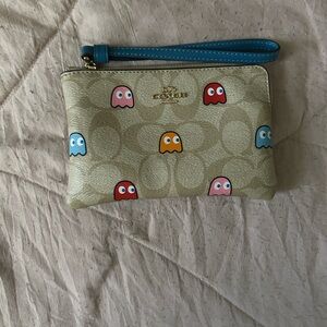 Coach Beige Wristlet with Pac-Man Design